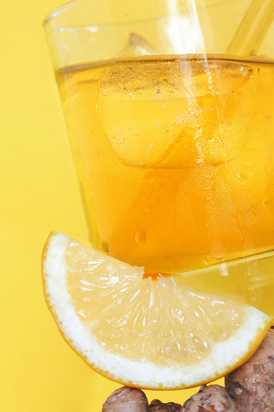 Iced Herbal Tea on Yellow Background